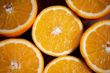 Sliced orange background. Closeup of juicy oranges