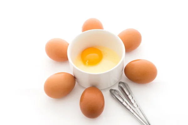 Multiple eggs arranged in a flower shape — Stock Photo, Image