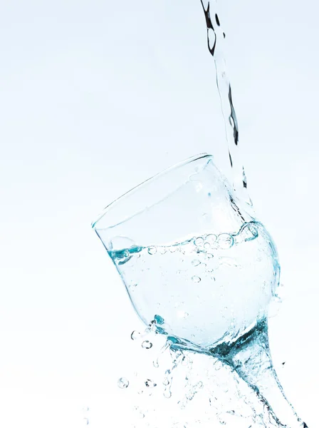 Water splashing in a glass , vertical — Stock Photo, Image