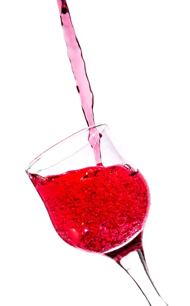 Splash em um copo de vinho tinto — Fotografia de Stock