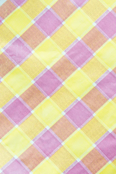 Yellow , violet , pink checkered tablecloth background — Stock Photo, Image