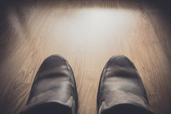 Brown shoes on wood background — Stock Photo, Image