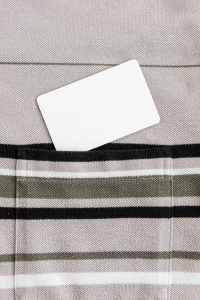 Clean white card in T-shirt pocket — Stock Photo, Image