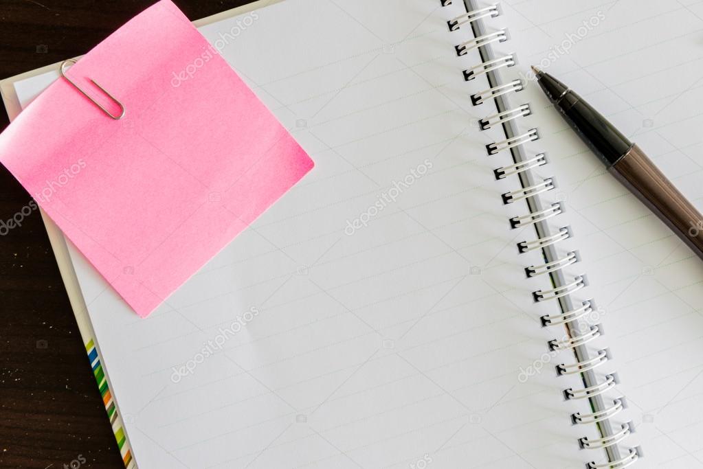 Notepad with pen and reminder notes on the table — Stock Photo
