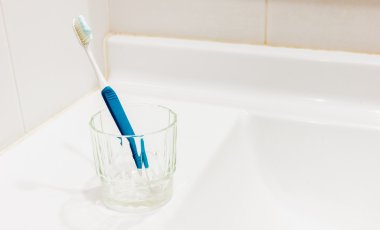 Toothbrushes in bathroom clipart