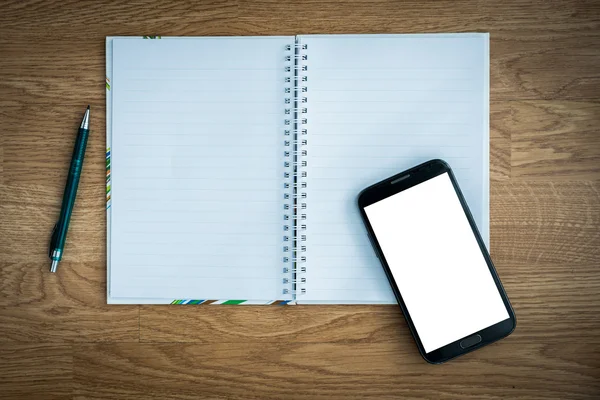 Caneta e smartphone e notebook — Fotografia de Stock