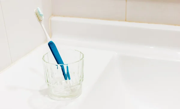 Toothbrushes in bathroom — Stock Photo, Image