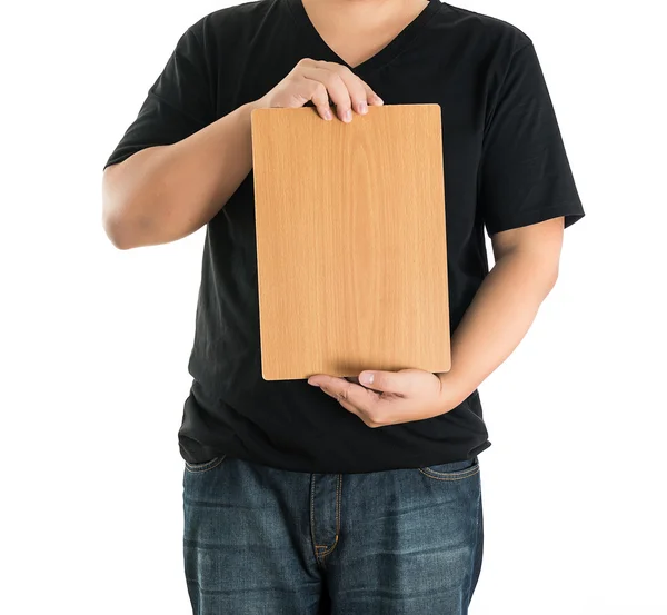 Primer plano de las manos del hombre mostrando tablero en blanco de madera —  Fotos de Stock