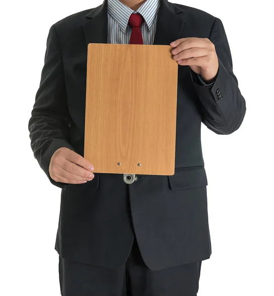 Manos de hombre de negocios mostrando tablero en blanco de madera — Foto de Stock