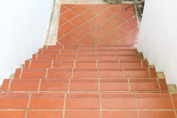 Red brick staircase. down way