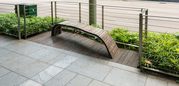 Modern design bench beside the street — Stock Photo, Image