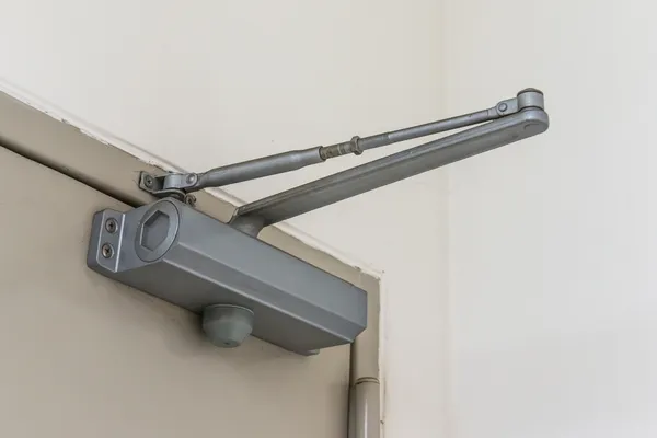 Automatic hydraulic leaver hinge door closer holder — Stock Photo, Image