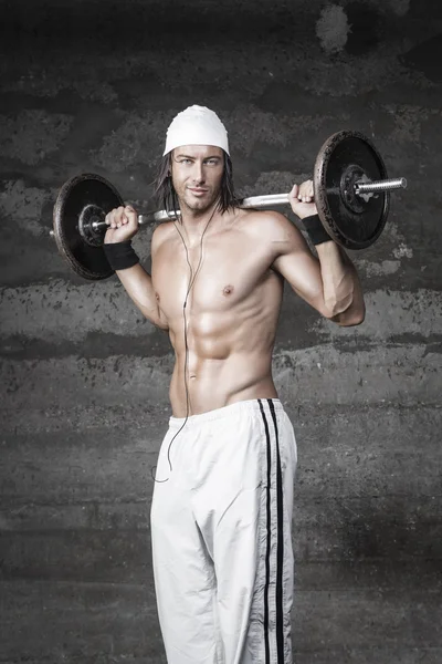 Handsome Bodybuilder posing in front of the camera — Stock Photo, Image