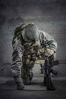Soldier with rifle and helmet clipart