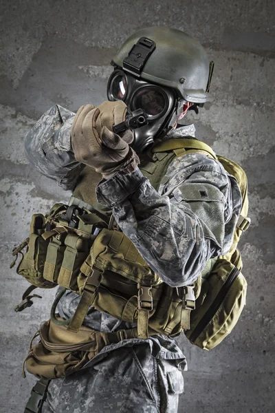 Gas Mask Soldier aiming handgun — Stock Photo, Image