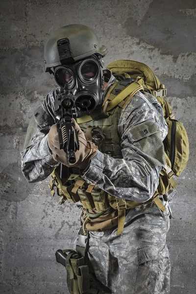 Gas Mask Soldier aiming rifle — Stock Photo, Image