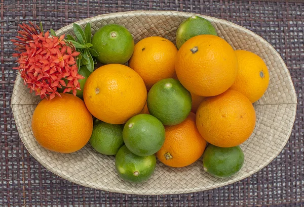 Lime and orange citrus fruit arrangement