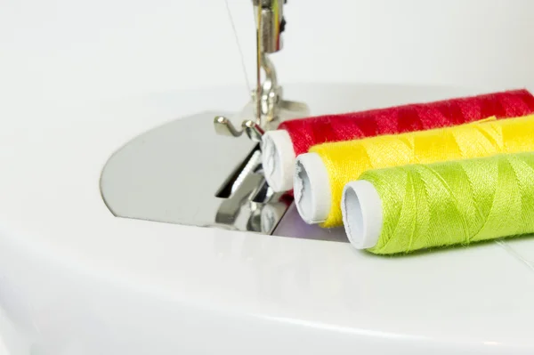 Multi colored bobbins of thread for sewing — Stock Photo, Image