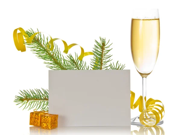 Champagne wine glass, pine branch with a serpentine, small gift boxes and the empty card isolated on white — Stock Photo, Image