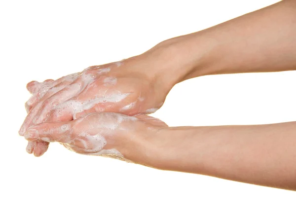 La mujer se lava las manos, aislada en blanco — Foto de Stock