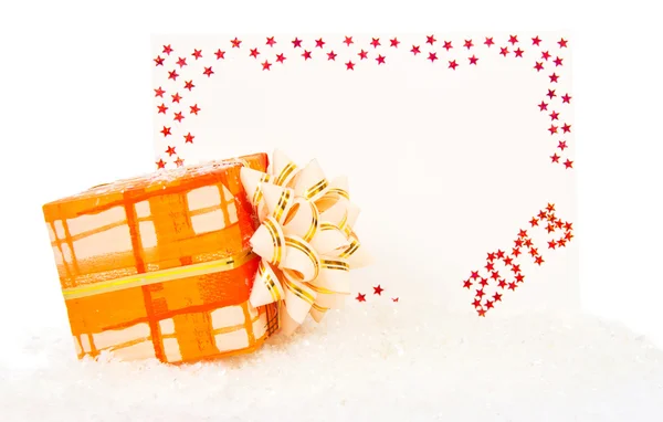 Bright red card on New Year 2013 with colorful gift box on snow isolated on white — Stock Photo, Image