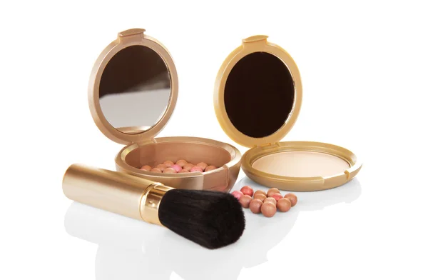 Compact powder, cosmetic blush and the brush — Stock Photo, Image