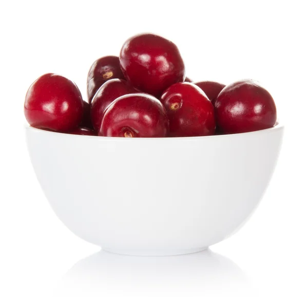 Red sweet cherries in a cup, isolated on white — Stock Photo, Image