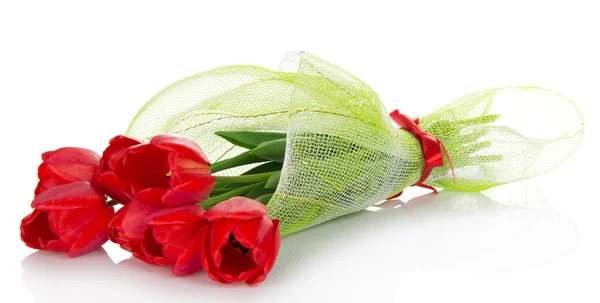 The bouquet of red tulips is decorated with a gossamer and a ribbon isolated on white — Stock Photo, Image