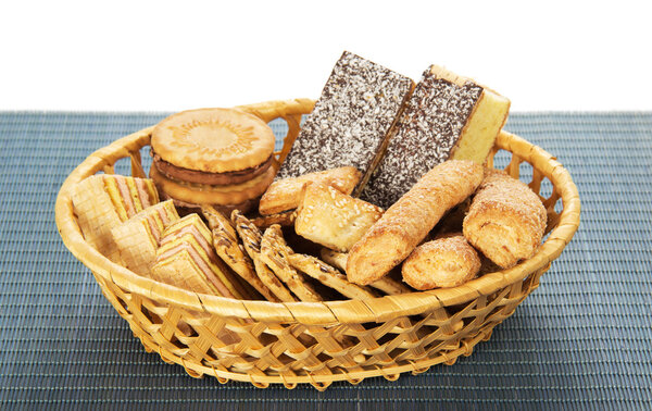 Cookies in a wattled basket on the bamboo cloth