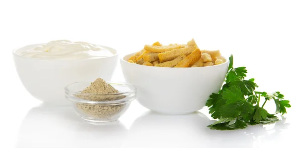 Bowl with sour cream, toasts, spices and the parsley, isolated on white — Stock Photo, Image