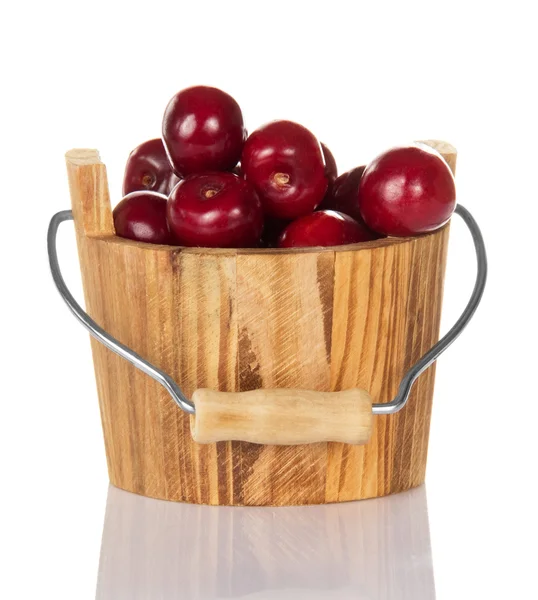 Ripe sweet cherries in the wooden bucket — Stock Photo, Image