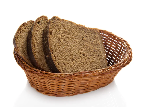 Fresh bread in a basket, isolated on white — Stock Photo, Image