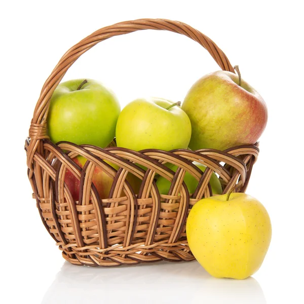 Wattled basket with the apples, isolated on white — Stock Photo, Image