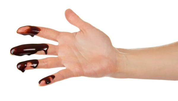 Le dita di una mano femminile sfigurano il cioccolato — Foto Stock