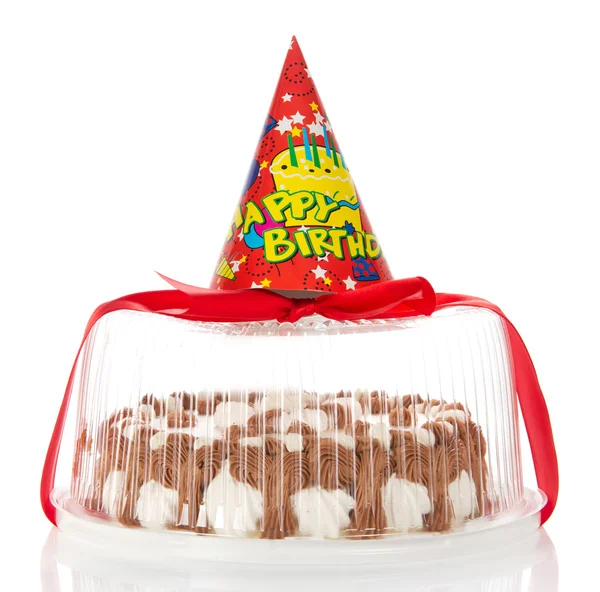 Torta em uma caixa, decorada com o cone brilhante, isolada em branco — Fotografia de Stock