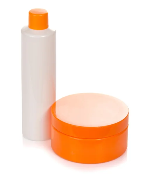 Crema y loción, para el cuidado de la cara, aisladas en blanco — Foto de Stock
