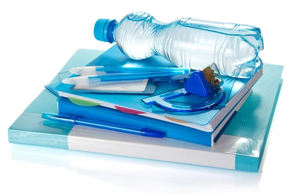 The book, notepad, stationery and bottle with the water, isolated on white — Stock Photo, Image