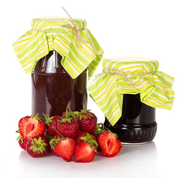 Two jars of jam and strawberry — Stock Photo, Image