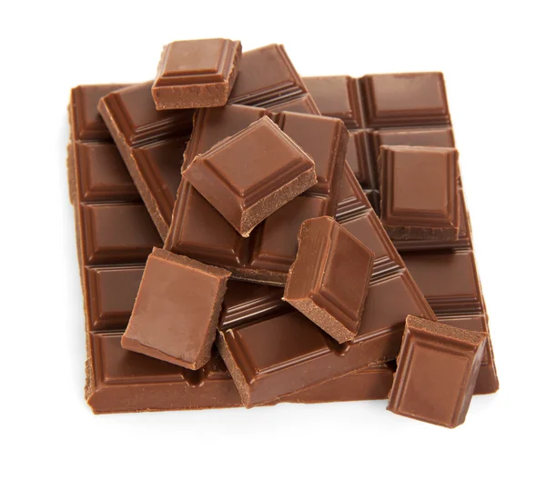 Celá deska mléčné čokolády a plátky — Stock fotografie