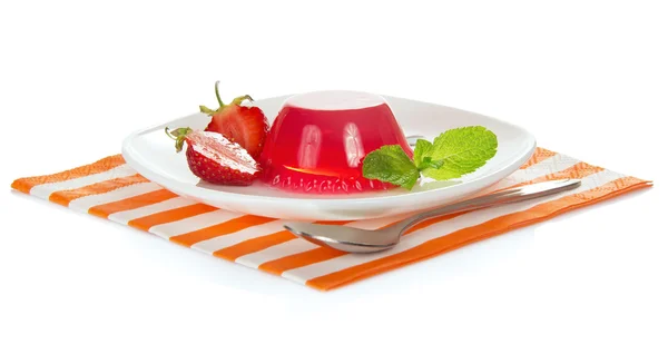 Plate with strawberry jelly and a spoon on the striped napkin — Stock Photo, Image