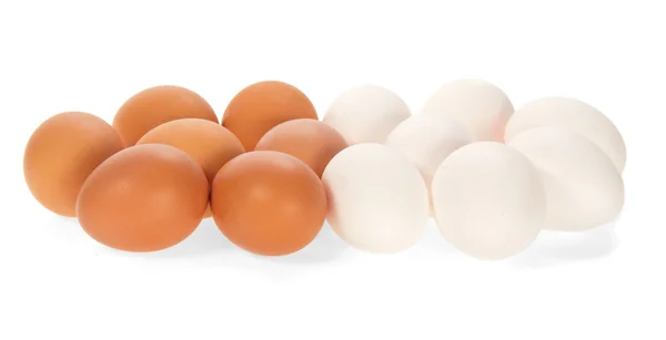 The white and brown eggs isolated on white — Stock Photo, Image