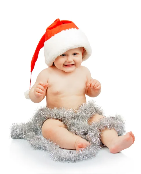 Nacktes Baby in Weihnachtsmann rotem Hut mit silbernem Lametta auf weißem Hintergrund — Stockfoto