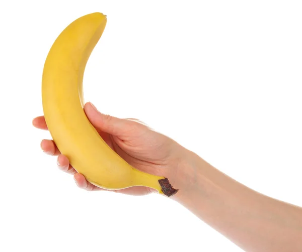Mão feminina com banana isolada em branco — Fotografia de Stock