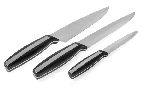 Set di coltelli da cucina in acciaio isolato su bianco — Foto Stock