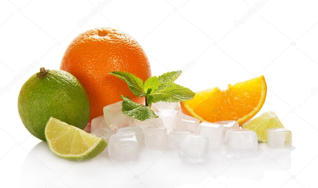 Oranges, limes, mint, cubes of ice and slices citrus