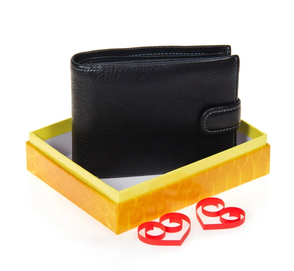 Man's black purse in yellow gift box with two red hearts from a paper tape isolated on white — Stock Photo, Image