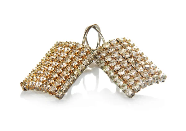Boucles d'oreilles féminines en or blanc avec les bijoux — Photo