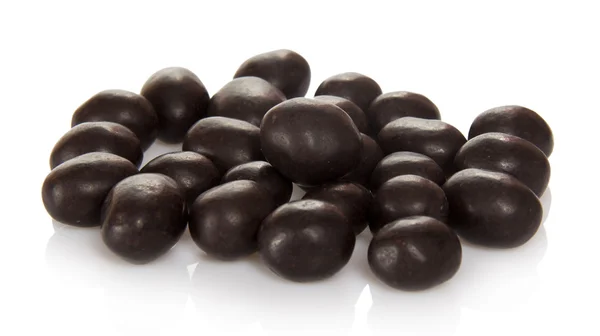 Sweet peanuts in chocolate isolated on whit — Stock Photo, Image