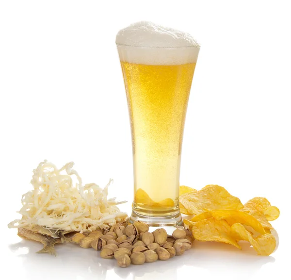 Glass of fresh light beer with foam and bubbles and the snack isolated on white — Stock Photo, Image