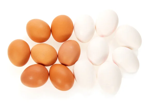 The white and brown eggs isolated on white — Stock Photo, Image